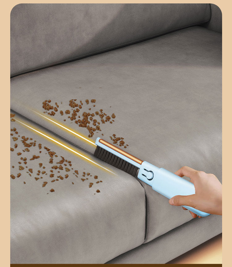 Blue detailing insert cleaning along a sofa seam